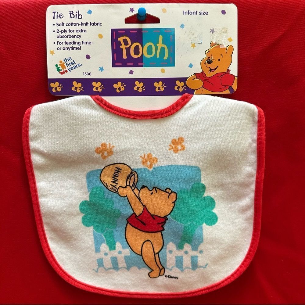 The first years Pooh Tie Bib infant